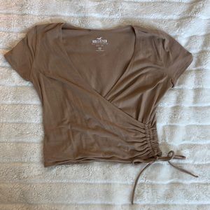 Here is a cute brown top from Hollister